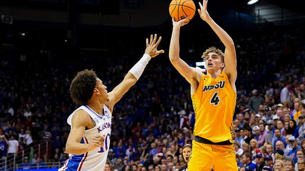 North Dakota State Bison forward Grant Nelson shoots against Kansas Jayhawks forward Jalen Wilson during the first half at Allen Fieldhouse.